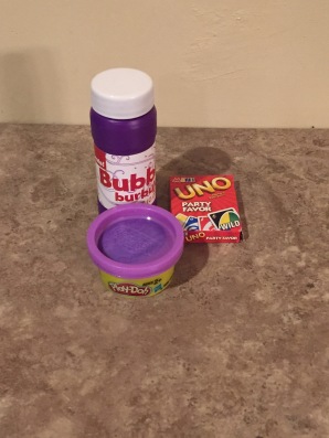 Bubbles, mini Uno cards, and Play-Doh.